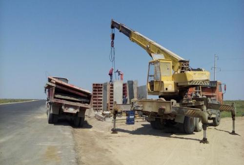 SP 92+00. Cast-in place concrete of wall slabs of bus shelter Tan village 