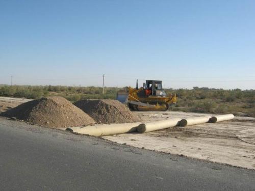 Laying a geotextile and construction of subbase SP 440 (LHS)