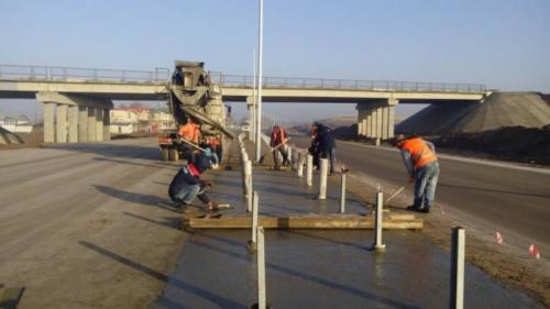 Construction of cement concrete pavement on median 