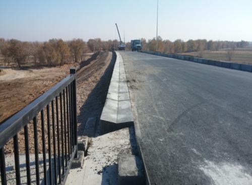 Guardrail on main road in Intimak village PK 590+00 on left side