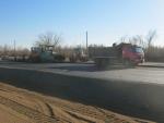  Laying the asphalt concrete mix  Kuraily village km 14