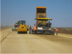 Crushed stone sand gravel mix placing at km 87