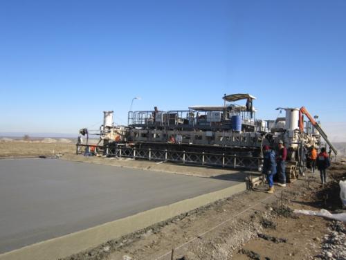 Concrete pavement laying process