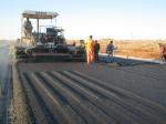 Laying the asphalt concrete mix  